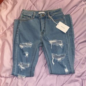 Brand new cute ripped skinny jeans size 1